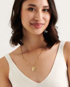 Timeless elegance combined with modern playfulness to create our gold Ancona necklace. Minimal yet detailed this necklace is the perfect layering piece you need in your summer wardrobe. Wear with the colourful Pompei Necklace or keep it classic with our Monti choker. 
Details

Handcrafted in a thick layer of 18k gold on sterling silverAdjustable chain length: 50 cm + 5 cm extenderPendant size: 1,8 cm x 1,6 cmChain width: 1,6 mmLuxurious cotton pouch & jewellery box with every order Elegant Necklace With Box Chain And Rectangular Pendant, Elegant Necklace With Rectangular Pendant And Box Chain, Chic Rectangular Necklace With Adjustable Chain, Elegant Rectangular Clavicle Chain Necklace, Elegant Gold Rectangular Charm Necklace, Elegant Square Pendant Necklace For Everyday, Minimalist Formal Necklaces With Rectangular Pendant, Minimalist Rectangular Pendant Necklace For Formal Occasions, Modern Necklace With Rectangular Pendant And Box Chain