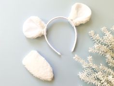 WHITE POLAR BEAR EARS HEADBAND AND/OR TAIL Other color variations are also available in the shop. IMPORTANT INFORMATION: NOTE that there may be slight variation in orders of this item as it is MADE TO ORDER. I do work hard to keep them very similar to what is shown though.** Selections / options are made via the drop down menus (i.e. size, style, tail option, flower option). Do not hesitate to ask if you have questions!  Custom orders are accepted with variations on color and quantity for many i Polar Bear Headband Craft, Forest Party Favors, Woodland Forest Party, Headband Crafts, Forest Party, White Polar Bear, Be Joyful, Bear Cub, Woodland Forest