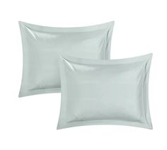 two silver pillow cases on a white background