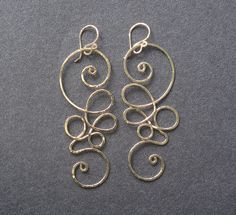 Nouveau 111 Hammered swirl earrings by CalicoJunoJewelry on Etsy Swirl Shaped Sterling Silver Jewelry In Gold Color, Handmade Gold Swirl Jewelry, Handmade Swirl Shaped Gold Jewelry, Gold Swirl Handmade Jewelry, Gold Swirl-shaped Handmade Jewelry, Gold Handmade Swirl Jewelry, Elegant Hand Forged Swirl Earrings, Gold Wire Wrapped Swirl Jewelry, Gold Swirl Wire Wrapped Jewelry