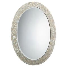 a round mirror with white and silver glitters on it's edge, in front of a white background