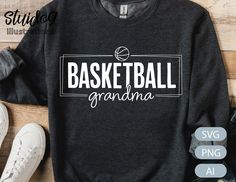 a black sweatshirt with the words basketball grandma on it next to sneakers and a pair of shoes