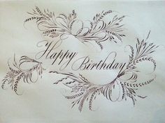 a happy birthday card with flowers and leaves on the front, handwritten in black ink