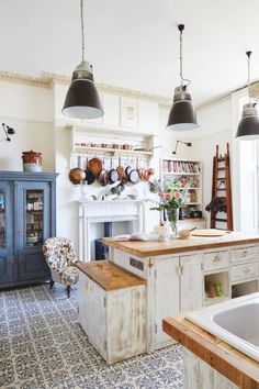 the kitchen is clean and ready to be used as a dining room or living room