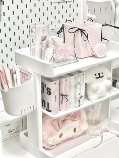 a white shelf filled with lots of different items