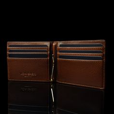 A premium leather men's wallet that combines excellent practicality with timeless elegance, ensuring it never goes out of style, enhanced with RFID-blocking technology to protect your personal and financial data from electronic theft. Handmade from luxurious full-grain, vegetable-tanned Italian "Cuoio Superiore" leather, this wallet is available in elegant black, solid brown, and classic tan, designed for multipurpose everyday use. The Money Clip feature allows quicker and easier access to cash, Luxury Smooth Grain Trifold Wallet For Business, Luxury Trifold Wallet For Formal Occasion, Luxury Business Trifold Wallet With Card Slots, Elegant Smooth Grain Leather Card Holder For Formal Use, Modern Trifold Wallet With Leather Lining For Formal Occasions, Luxury Trifold Wallet With Card Slots For Business, Luxury Business Wallets With Leather Lining, Elegant Business Trifold Wallet With Leather Lining, Elegant Formal Card Holder With Smooth Grain