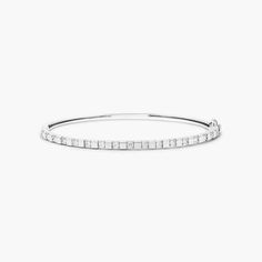 14K White Gold Abyss Lab-Created Diamond Bangle Bracelet. She'll love the anytime appeal of this classic bangle bracelet. Fashioned in 14K white gold, this look showcases a row of lab-created diamonds - each and a brilliant buffed luster, this bangle secures with a single snap clasp. Modern White Diamond Bangle Bracelet, White Diamond Jubilee Bangle Bracelet, White Diamond Bangle Bracelet Fine Jewelry, White Diamond Bangle Bracelet, White Diamond Bangle Bracelet In Fine Jewelry Style, Classic White Gold Cuff Bracelet With Jubilee Design, Classic White Gold Jubilee Cuff Bracelet, White Round Bangle In Fine Jewelry, White Stackable Bracelets For Formal Occasions