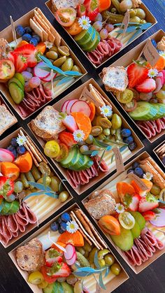 six boxes filled with different types of food