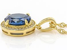 Bella Luce® blue sapphire and white diamond simulants 3.29ctw oval and round, Eterno™ 18k yellow gold over sterling silver pendant with chain. Pendant measures approximately 0.75" L x 0.38" W and has a 1mm bail. Also includes an 17.5"-18 inch singapore chain with 2" extender and a lobster claw closure. Gold Necklace With Center Stone In Fine Jewelry Style, Gold Necklace With Center Stone Fine Jewelry, Gold Necklace With Round Center Stone, Gold Round Necklace With Center Stone, Fine Gold Necklace With Center Stone, Pendant With Chain, Diamond Simulant, Chain Pendant, Sterling Silver Pendant