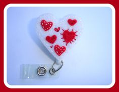 Badge reel  nurse badge holder retractable  by clippiecollections Heart Applique, Nurse Badge Holders, Red Felt, Nurse Badge Reel, Nurse Badge, White And Red