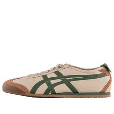 The Onitsuka Tiger Mexico 66 'Brown Green' is a timeless classic that combines vintage style with modern touches. Crafted from premium leather, the sneaker features a cross-stitched heel for added stability and all-day comfort. Perfect for urban living, work and leisure, the Mexico 66 is inspired by the 60s and is sure to be a hit. The classic brown and green colorway will add a touch of sophistication to any outfit. (SNKR/Retro/Unisex/Low Top)