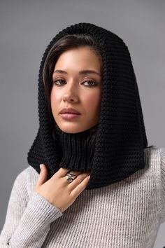 Black Hooded scarf, Turtleneck Hoodie, Knit Balaclava, Hooded Cowl, Knitted Hood Scarf, Womens Woolen Hood, Wool Scarf, Gift for Her The multifunctional winter accessory is made of semi-woolen yarn. The model consists of an elastic collar that covers the neck well and a spacious hood in a textured weave. The elegant accessory has a wide lapel for extra warmth. Leave this snood on after you take off your jacket, it will become a stylish addition to a pullover or sweater. A super soft and cozy hooded scarf. Product details: 70% acrylic, 20 % mohair, 10 %wool Width - 14 in Length - 20 in Turtleneck Hoodie, Knit Balaclava, Hood Scarf, Hooded Cowl, Knitted Balaclava, Hooded Scarf, Knitted Hood, Scarf Gift, Elegant Accessories