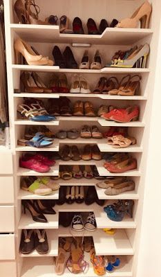 a closet filled with lots of different types of shoes