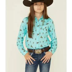 New! Youth girl's Roper Turquoise CACTUS & COWBOY PRINT WESTERN SHIRT 3 SIZES! Allover cactus & cowboys printLong Sleeve1 Pt curved front and back yokesSawtooth flip pocketsSnap FrontGarment washed for softness100% rayon. Hand wash cold, no bleach. Hang to dry. Warm iron if needed.Items are subject to availability because they are cross listed with other online sites. Please check out my Ebay store as I am always getting exciting new products in!  If you don't see what you're looking for, just drop me a line because I can probably get it for you! I do have a walk-in store in Ohio! RETURN POLICY: You must contact me within 3 days of receiving item for return instructions and return item within 30 days. Item MUST be returned new & still tagged with original packaging, clean & unuséd. No retu Cute Fitted Blue Shirt, Cowboy Print, Chukka Shoes, Detangler Spray, Because I Can, Western Shirt, Western Shirts, Ebay Store, Return Policy