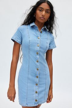 Western-inspired UO mini dress in a soft, stretch denim. Designed in a slim silhouette featuring a collared neckline, short sleeves and button-down front for a vintage vibe. Only at Urban Outfitters. Features UO Monica button-up short sleeve denim mini dress Collared shirt dress Soft & stretchy denim Collared neckline and short sleeves Button-down front with tailored seams Slim tailored fit Mini length Button closure UO exclusive Content + Care 79% Cotton, 20% polyester, 1% spandex Machine wash Collared Shirt Dress, Blue Fits, Denim Mini Dress, Vintage Vibe, Collared Shirt, Denim Mini, Collar Dress, Stretch Denim, Urban Outfitters