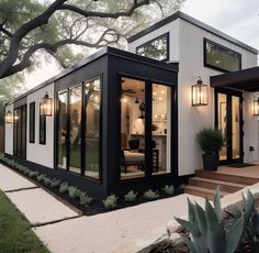 a modern home with black and white exterior