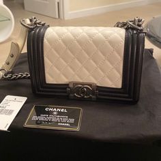 Chanel Lamb Skin Boy Bag White/Black, Hard To Find, Limited Addition, Purchased At Saks, Worn Only Twice. New Condition. Box, Dust Bag, Authenticity Card And Tag Included. Size 8x5x3. Grey Chanel Boy Bag, Chanel Boy, Chanel Boy Bag, White Bag, Chanel Bag, White Black, Dust Bag, White And Black, Chanel