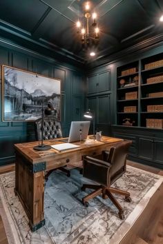 A cozy, dark-toned home office with a wooden desk, leather chair, bookshelves, and framed landscape photo. Home Office Ideas Masculine, Man’s Office, Cozy Home Office Ideas, Home Office Decor Inspiration, Construction Office, Dorm Room Hacks, Small Fireplace, Cozy Home Office, Room Hacks