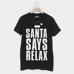 "Relax... It's Christmas... Santa's orders! Super-soft men's Christmas fashion t-shirt with \"Santa Says Relax\" slogan print. Throw on this Christmas special, cosy up with loved ones and get ready to jingle bell ROCK! This fantastic festive design is the perfect Christmas gift for your dad, partner, family or as a Secret Santa gift for your work mates. It's also a brilliant gift for hard to buy for teens! View our full range in our Batch1 storefront - all of our products are lovingly designed, Winter Crew Neck T-shirt With Logo Print, Winter Logo Print Crew Neck T-shirt, Winter Relaxed Fit T-shirt With Logo Print, Black Christmas Tops With Text Print, Winter Relaxed Fit Screen Print T-shirt, Black Tops With Text Print For Christmas, Black Text Print Top For Christmas, Christmas Crew Neck T-shirt For Streetwear, Christmas Crew Neck Streetwear T-shirt