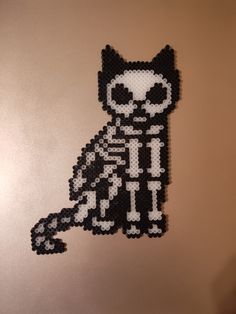 a black and white cat made out of legos