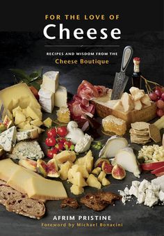 a book cover with lots of cheeses and other food items on top of it