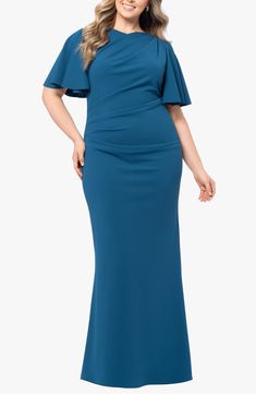 Soft ruching shapes the silhouette of this striking gown designed with a V-dipped back and fluttering sleeves that end at the elbow. 59 1/2" length; 6" train (size 18W) Hidden back-zip closure Bateau neck V-back Elbow-length sleeves Lined, except sleeves 94% polyester, 6% spandex Dry clean Made in the USA of imported fabric Formal Dresses With Draped Flutter Sleeves, Formal Dresses With Draped And Flutter Sleeves, Fitted Pre-draped Evening Dress With Cape Sleeves, Flutter Sleeve Dresses For Gala, Elegant Ruched Maxi Dress With Flutter Sleeves, Elegant Ruched Dress With Ruffle Sleeves, Formal Evening Dress With Flutter Sleeves, Elegant Flutter Sleeve Evening Dress For Gala, Short Sleeve Maxi Dress With Ruched Bodice For Evening