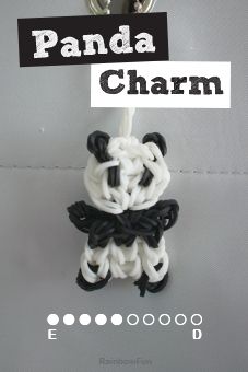 the panda charm is made with black and white yarn, which are attached to a hook