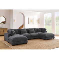 a living room with a large sectional couch