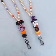 This listing is for a  Halloween Lanyard for Name Badges or keys.  Made with 8mm natural wood Beads on the strand. If you would like to create a custom color combination specific to your taste and interests please send me a message! All lanyards are a standard size- and i can customize the lengths if you like. please message me. All lanyards are secured with a breakaway clasp at the top.  This product includes small parts!! That pose as a choking hazard to small children. Do not leave children unattended with this product. Not meant for children. Consumer assumes all responsibility. Halloween Lanyard, Wooden Bead Garland, Work Badge, Teacher Lanyard, Beaded Lanyards, Bead Garland, Name Badges, Beaded Garland