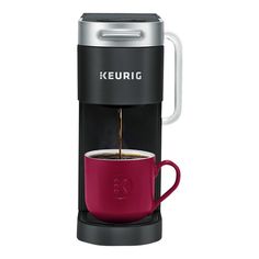 keurig single serve coffee maker with red cup and handle, black / silver