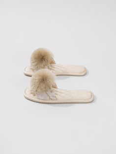 Embrace the essence of Eastern elegance with this Embroidered Slippers. Crafted with meticulous attention to detail, these slides feature premium tassel pom-poms that are luxuriously soft and resistant to shedding, ensuring long-lasting comfort with every step.Experience unparalleled cushioning and support with our silky-smooth satin midsole, providing a gentle yet resilient feel that maintains its shape over time.Stay steady on your feet with our lightweight and slip-resistant TPR outsole, offering a comfortable and secure grip with every stride.Step into sophistication and style with Ulivary's Embroidered Slippers for all season, where tradition meets modern comfort. Embroidered Slippers, Women Supporting Women, Pom Poms, Tassels, Slides, Champagne, Pom Pom, Essence, Slippers