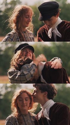 a man and woman in period clothing kissing each other