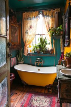 an old fashioned bathtub with plants in the window