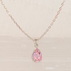 💎 A crystal pink necklace that will amaze you with its mini and 3D cut. The necklace is a great complement to other necklaces and is also stylish and elegant on its own. 💎 We offer chain lengths from 14-26 inches. You can give your custom size if you want to use it as a chooker. Suitable for 12-14 inch chooker. 💎 Also perfect for gifting to your loved ones. A gift for your mommy, sister and bestfriends to your daughter. Moreover, we make it a special gift package for you. 💎 October birthston Pink Chain Necklace, Pink Dainty Pendant Crystal Necklace, Pink Dainty Crystal Pendant Necklace, Dainty Pink Crystal Pendant Necklace, Pink Sterling Silver Pendant Crystal Necklace, Pink Dangle Charm Necklaces, Pink Pear-shaped Gemstone Necklace, Pink Teardrop Jewelry For Jewelry Making, Dainty Teardrop Gemstone Crystal Necklaces