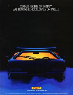 an advertisement for the car that is on display in front of a black background with yellow lights