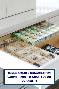 a kitchen cabinet with drawers filled with cards and other items that are labeled touch kitchen organization cabinet which is crafted for durability