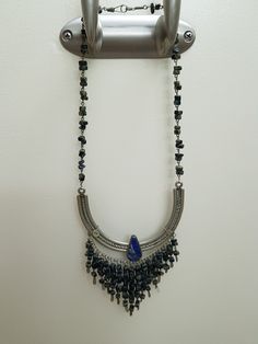 Vintage Peruvian Lapis Silver Bib Style Necklace,, lovely craftsmanship.. each stone is linked with silver wire and a nice Lapis stone inlaid in silver ornate metal is the center pieces.. shorter style necklace.. 15 inches Silver Bohemian Jewelry With Natural Stones, Bohemian Silver Jewelry With Natural Stones, Spiritual Metal Necklaces With Natural Stones, Spiritual Metal Necklace With Natural Stones, Silver Long Necklace With Stones, Bohemian Metal Jewelry With Silver Beads, Metal Dangle Necklaces With Natural Stones, Metal Necklaces With Natural Stones Dangle, Adjustable Antique Silver Bohemian Necklace