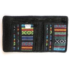 These practical wallets are made from traditional Gyari geometric weave fabric. Each wallet features dollar bill pockets, one full-length zippered pocket, a zippered coin pocket and a credit card pocket. Designs/colors vary. Email us if you'd like to see a photo with options before shipping. Handmade in Nepal Dimensions: 9 in x 5 in (open); 3.5 in x 5 in (closed) With every product you purchase, you are helping provide employment, educational opportunities and medical care to artisans in Nepal. Cool Wallets, Cotton Wallet, Pocket Designs, Handmade Wallet, Fabric Wallet, Handmade Wallets, Best Wallet, Weave Fabric, Granola Girl