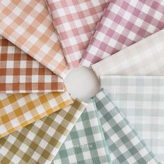 many different colored checks are arranged together