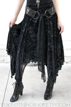 Black Gothic Velvet Bottoms, Black Velvet Gothic Bottoms, Gothic Ruffled Skirt, Gothic Long Ruffled Skirt, Gothic Long Ruffled Skirt Bottoms, Gothic Skirted Bottoms With Ruffled Skirt, Witchy Fitted Skirt For Costume Party, Black Gothic Skirt With Asymmetrical Hem, Gothic Party Bottoms With Asymmetrical Hem