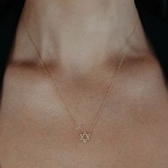 This high-polished 14K yellow gold Star of David pendant is the perfect go-to gift for your next Bar Mitzvah. 14K Yellow Gold Length: 18 Inches Minimalist 14k Gold Star Of David Necklace, Elegant 14k Gold Star Of David Jewelry, Dainty Star Of David Jewelry For Anniversary, Minimalist Yellow Gold Star Of David Necklace, Dainty Yellow Gold Star Of David Necklace, Star Of David Yellow Gold Plated Jewelry, Elegant Yellow Gold Star Of David Necklace, Silver Star Of David Necklace In 14k Gold, 14k Gold Silver Star Of David Necklace