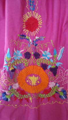 "Lovely hot pink cotton 70s Mexican embroidered dress. Square neck heavily embroidered around. Small square wide sleeves. Colourful heavily embroidered down the front with flowers and leaves. Back of dress is plain apart from some small embroidery at back of neck. Bust 34 Across shoulders 17inches Sleeves 5 1/2\" x 11 1/2\" Length of dress 43inches" Pink Bohemian Dress With Resham Embroidery, Bohemian Pink Dress With Resham Embroidery, Bohemian Pink Dress With Intricate Embroidery, Summer Pink Embroidered Dress With Intricate Embroidery, Spring Pink Dress With Intricate Embroidery, Pink Dress With Embroidered Border For Festivals, Pink Embroidered Dress With Embroidered Hem For Spring, Pink Bohemian Embroidered Dress, Traditional Pink Embroidered Dress With Floral Design