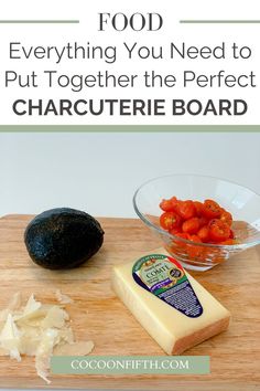 an avocado, cheese and tomatoes on a cutting board with the words food everything you need to put together the perfect charlotte board