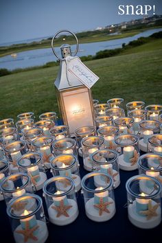 there are many candles that have been placed in the shape of snowflakes and starfishs