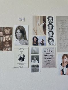 many different pictures are hanging on the wall with some paper clips attached to each one