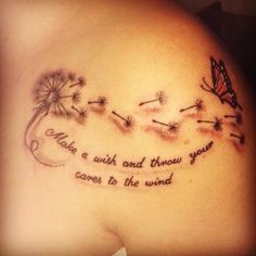 a woman's back with a quote on it and dandelions in the background