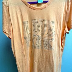 Never Worn Just Hanging In Closet Size Xl Casual Rhinestone T-shirt For Summer, Casual Summer T-shirt With Rhinestones, Casual Crew Neck T-shirt With Rhinestones, Spring Short Sleeve T-shirt With Rhinestones, Spring Short Sleeve Rhinestone T-shirt, Rhinestone Graphic Tee, Orange T Shirt, Orange T Shirts, Closet Size