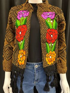 This is one of a kind beautiful jacket to wear daily or for a special ocassion. The colors on the the embroidered are beautiful and elegant. It is lightweight and cozy. Long Sleeve Outerwear With Beaded Fringe For Spring, Beaded Fringe Long Sleeve Outerwear For Spring, Winter Outerwear With Beaded Fringe And Long Sleeves, Long Sleeve Beaded Fringe Festival Outerwear, Bohemian Floral Embroidered Cardigan, Multicolor Floral Embroidered Long Sleeve Outerwear, Multicolor Folk Outerwear With Floral Embroidery, Folk Style Multicolor Embroidered Kimono, Suzani Embroidery Jacket