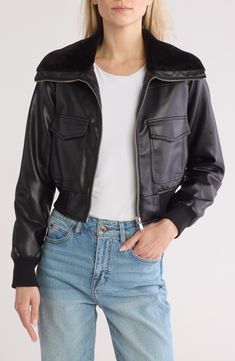 An abbreviated hem updates the look of this edgy bomber jacket that's topped with a fluffy faux-fur collar and lined in diamond quilting to keep you warm and cozy when the temp drops. 19 1/4" length
 Front zip closure Spread collar Long sleeves Front flap pockets Lined, with 100% polyester fill 100% polyester with polyurethane coating and 100% polyester faux-fur trim Dry clean Imported Faux Fur Collar, Diamond Quilt, Fur Collar, Fur Trim, Warm And Cozy, Nordstrom Rack, Blazer Jacket, Faux Fur, Bomber Jacket