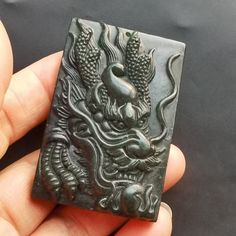 Chinese antiquity style dragon Carved Amulet Jade Pendant, 1.Material: natural black green jade stone bead, top with pass hole 2.Size of bead:approx 59mmx38mmx9mm   in size.   3. this price is 1pendant. 4. fit make earring /brooch/pendant/necklace ect jewelry, 5.If you have speical requests, I'll be happy to do it for you. 6.Returns:I accept returns. 1)Send me an email within 7 days and let me know the item is being returned. 2)I will refund your money after we recieve our merchandise. 3)Precond Black Spiritual Jewelry With Dragon Design, Spiritual Black Jewelry With Dragon Design, Chinese Dragon, Jade Stone, Jade Pendant, Green Jade, How To Make Earrings, Jade Green, Stone Pendant